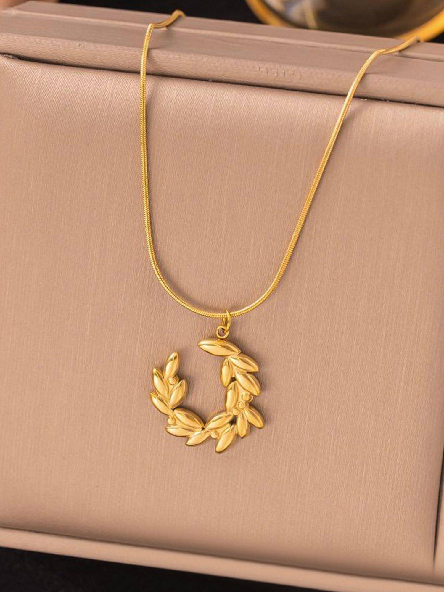 Jewels Galaxy Gold Plated Anti Tarnish Stainless Steel Crescent Moon Themed Necklace