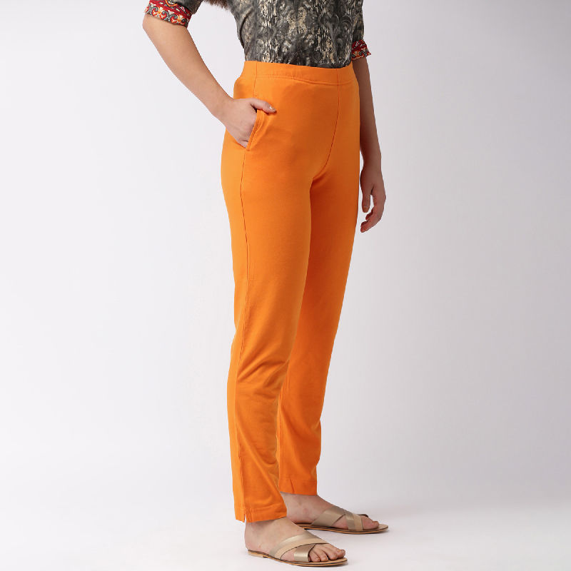 NEUDIS Women Orange Regular Fit Solid Ribbed Parallel Track Pants