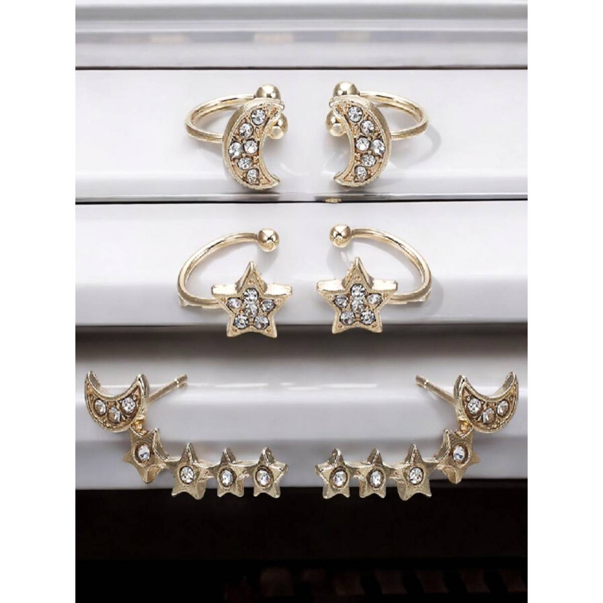 OOMPH Pair Of Gold Tone Crystal Small Star and Moon Ear Cuff Earrings