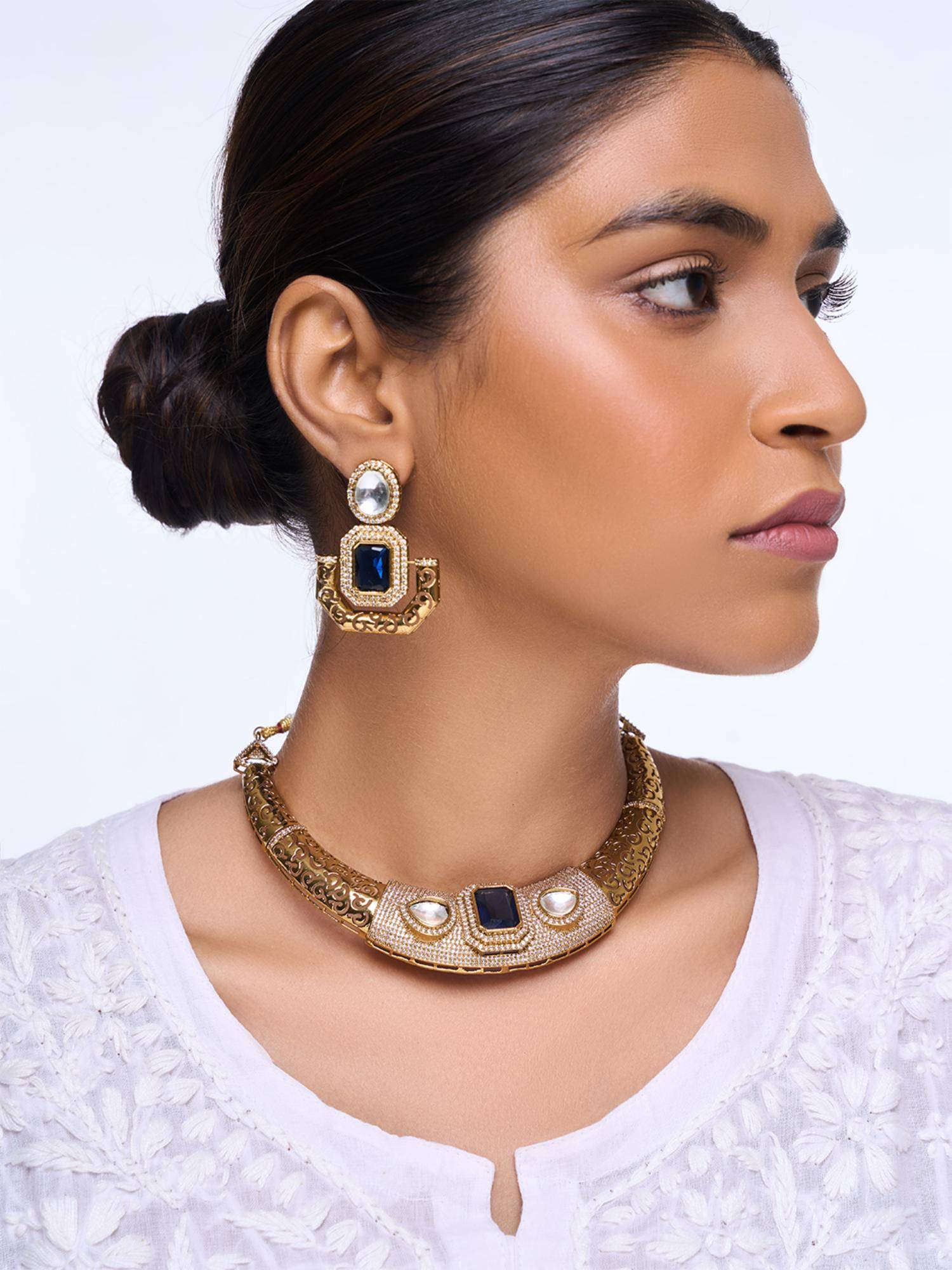 CAO JEWELLERY Designer Golden Cz Hasli with Blue Stone Jewellery Set