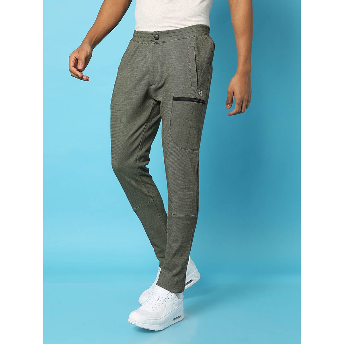 Buy Campus Sutra Men Solid Green Track Pants Online