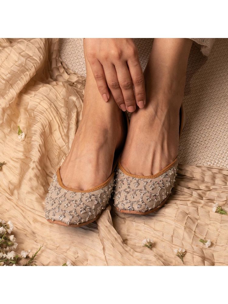 Coral Haze Light Taupe Juttis With Silver Sequin Jaal And A Metallic Back