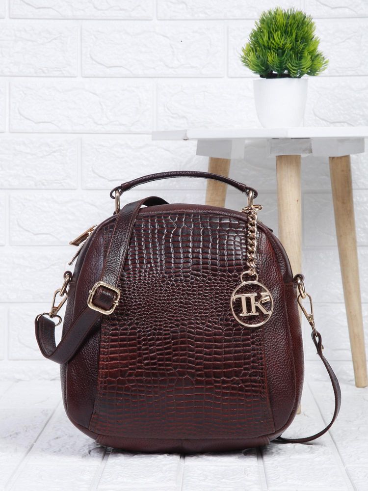 teakwood women maroon leather textured backpack