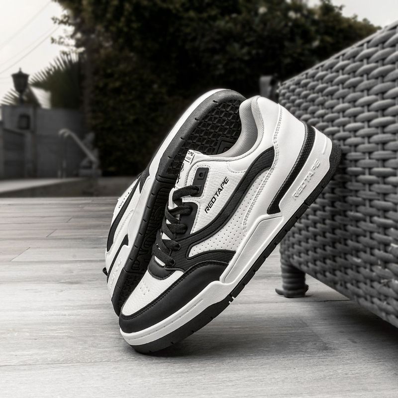 Buy Red Tape Women s Solid White Black Sneakers Online