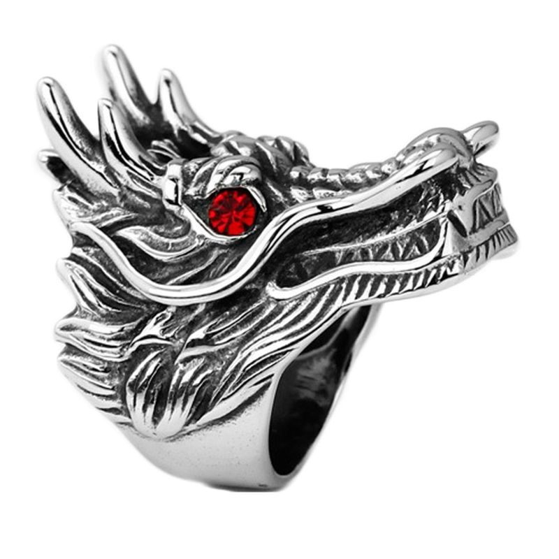 A Chinese Silvered Metal Dragon Head Ring