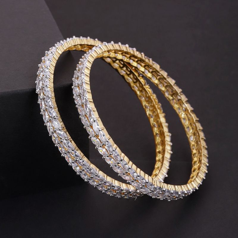 Priyaasi Set Of 2 Gold Plated Dual Line Cubic Zirconia Studded Bangles - 2.4