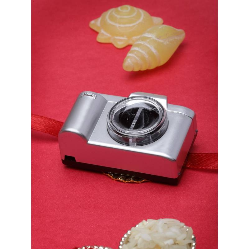 Buy PANASH Kids Grey Camera-Shaped Toy Light Rakhi With Roli Chawal Online