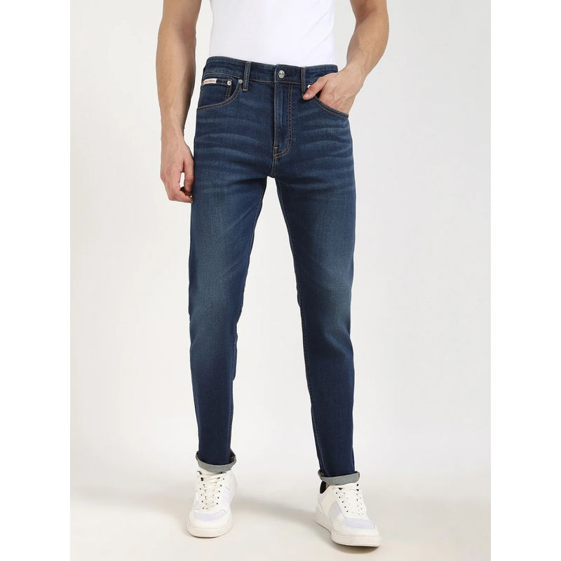 Calvin Klein Blue Medium Wash Tapered Fit Mid Rise Jeans (38)
