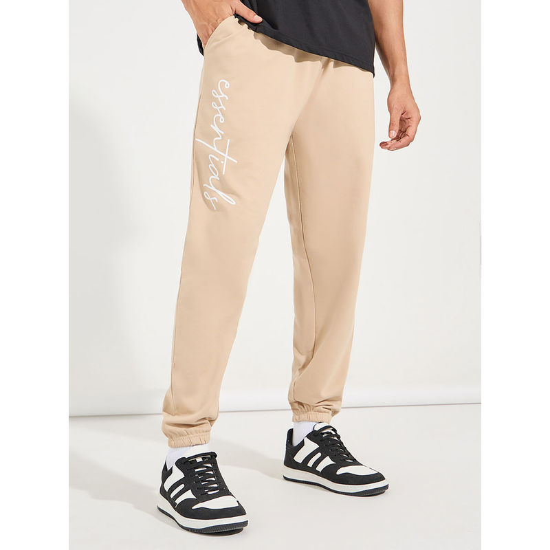 Styli Men Beige Relaxed Fit Typography Joggers with Slant Pocket (S)