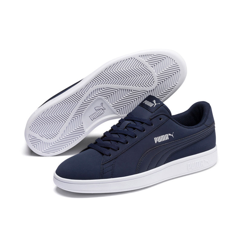 navy blue and white puma suede
