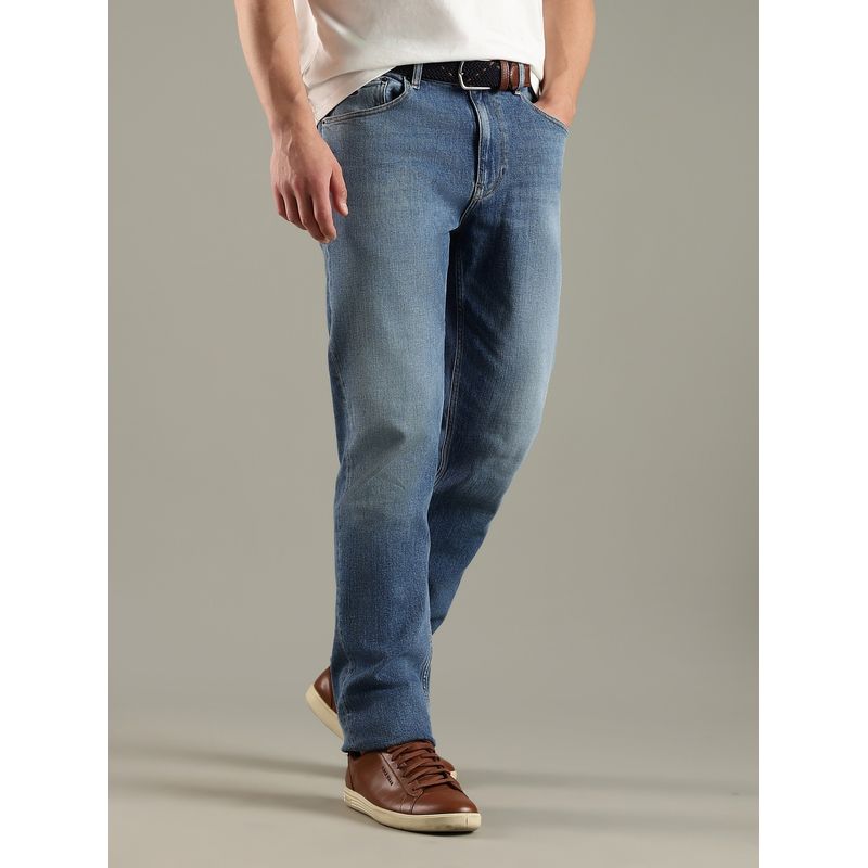 Tommy Hilfiger Men Blue Solid Jeans (32)