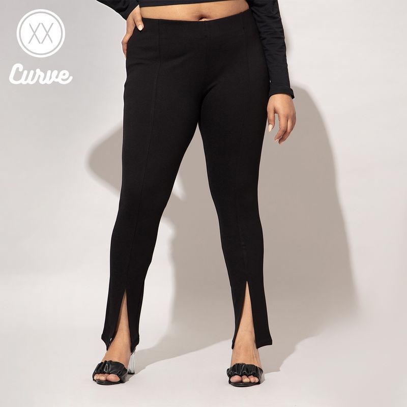 Twenty Dresses by Nykaa Fashion Curve Black Solid Front Slit Basics Fitted Jeggings (40)