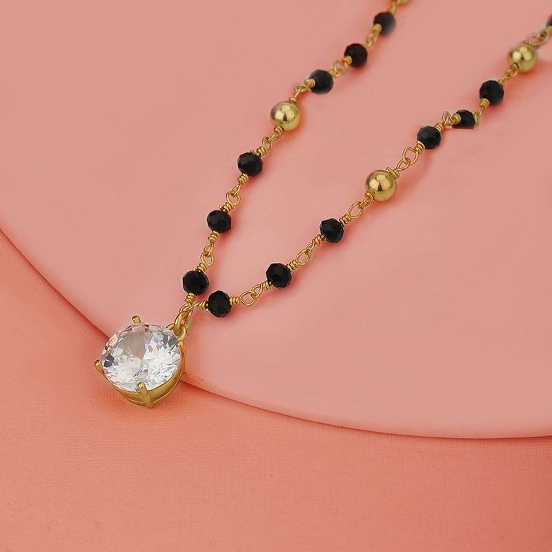 Buy Carlton London Gold Black Toned CZ Studded Mangalsutra Online