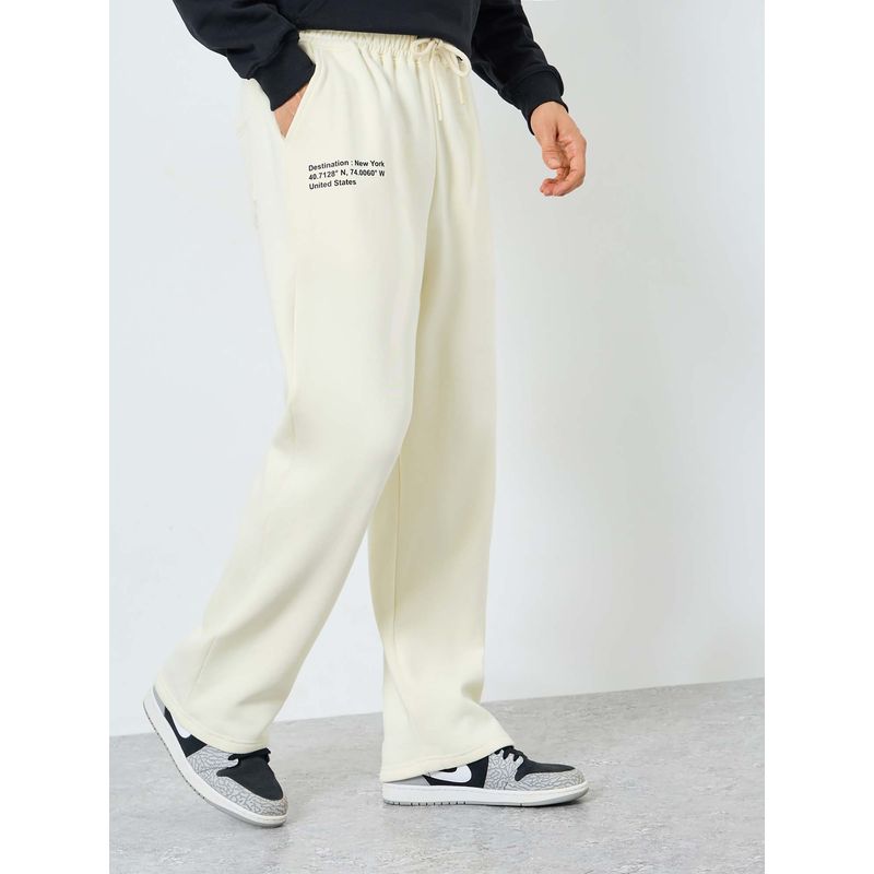 Styli Men Slogan Printed Oversized Open Hem Track Pant - Cream (L)