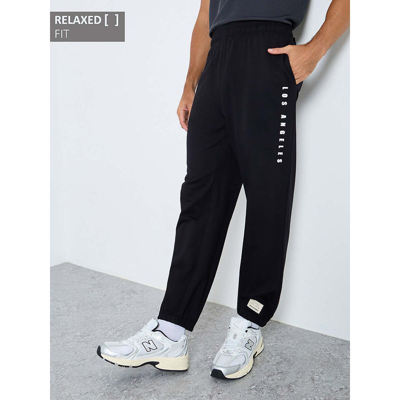 Styli Men Black Relaxed Fit City Text Thigh Printed Joggers (S)
