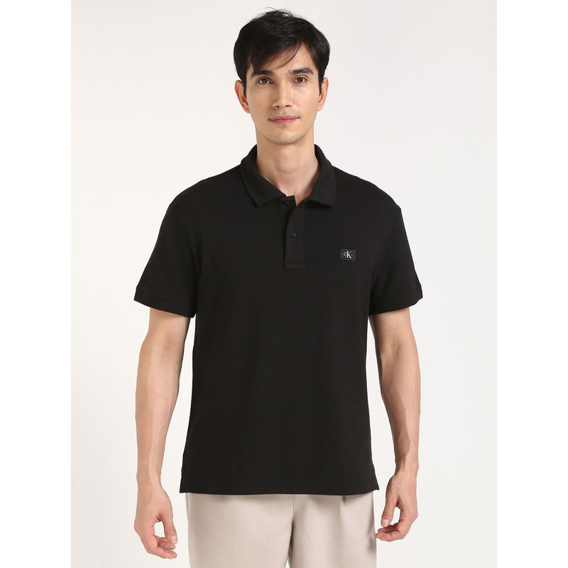 Calvin Klein Mens Black Solid Casual Polo T-Shirt (M)