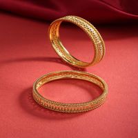 Priyaasi Set Of 2 Gold-Plated Textured Bangles
