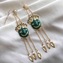 UPAKARNA Eccentric Portrait Statement Earrings