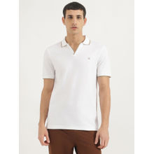 United Colors of Benetton White Cotton Blend Solid Polo T-Shirt