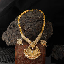 Anika's Creations Traditional Party Wear Stone And Pearl Studded Gold Plated Jewellery Set