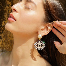 Pipa Bella by Nykaa Fashion Clear Stone Embellished Evil Eye Pearl Drop Earrings