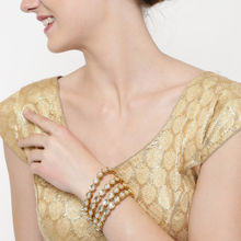 PANASH Set Of 4 Gold-plated Kundan Studded Handcrafted Patterned Bangles (PIVZ210ba1061_24)