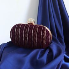THE TAN CLAN Bell Embroidered Oval Clutch