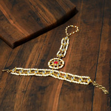 Karatcart Gold-plated Pearl Beads Kundan Chain Hathphool With Red Stone