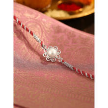 Ornate Jewels 925 Silver Freshwater Pearl Designer Thread Rakhi for Brother With Roli Chawal