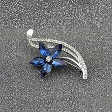 Mahi Rhodium Plated Floral Designer Montana Blue Crystal Brooch for Women (BP1101039RMBLU)