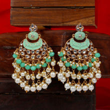 Anika's Creations Stone and pearl studded traditional Jhumka Earring