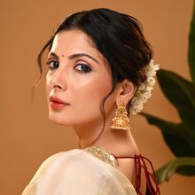 Vriksham Brass Plated Stone Studded Jhumka Earrings For Women